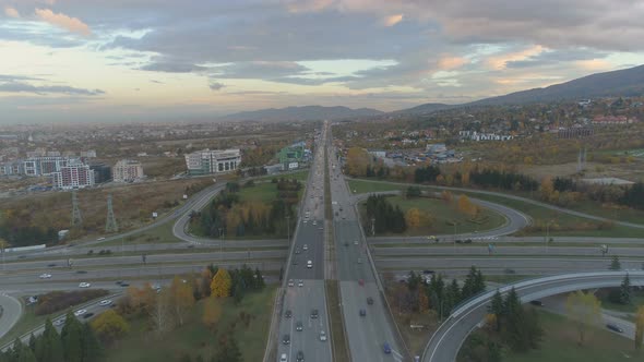 Cars Driving Slow at Rush Hour on Busy Road, Aerial Drone View of Sofia, Bulgaria