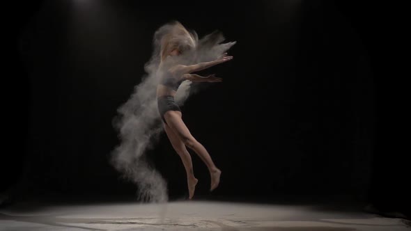 Slow Motion of Alluring Girl Throwing Dust Particles in Air