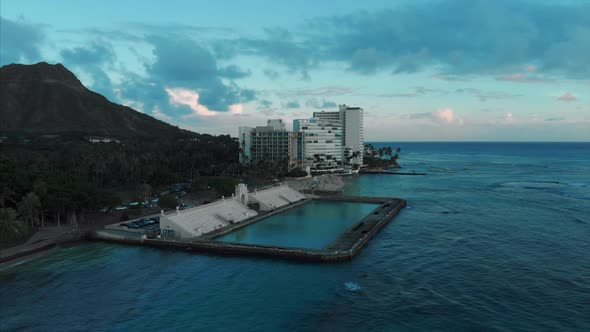 Aerial drone footage of Honolulu, Hawaii. Beautiful real estate, buildings in the city. Palm trees