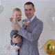 Father Holding on Hands Infant Small Child - VideoHive Item for Sale