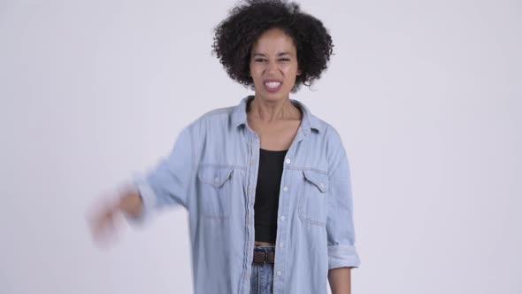 Young Angry African Woman Giving Thumbs Down