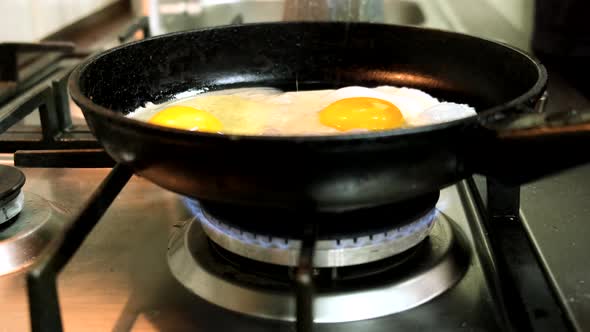 Frying Eggs on the Pan Close Up