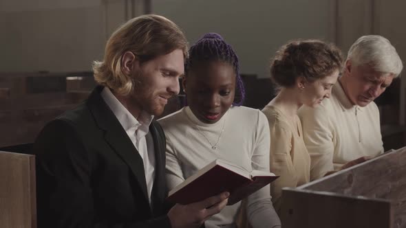 Four People Reading Bible in Lutheran Church