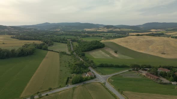 Aerial images of Tuscany in Italy cultivated fields summer,