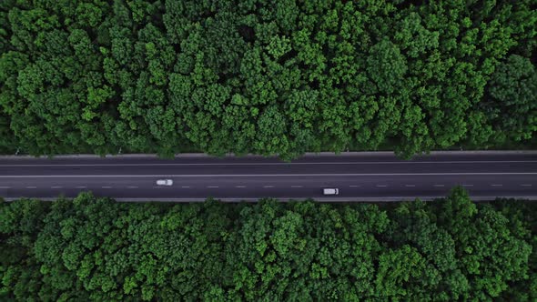 Aerial Top View Over Straight Road With Cars