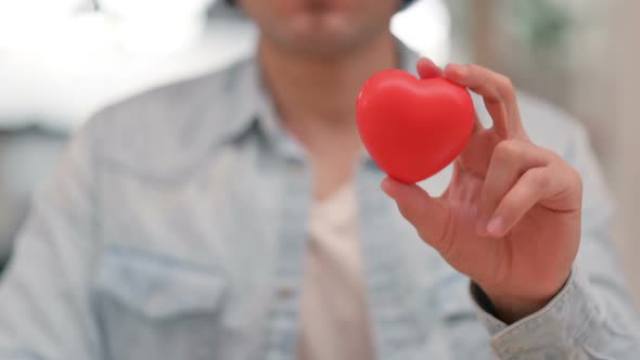 Male Hands Holding Heart Shape Close Up