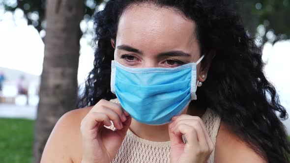 Portrait of a Young Student Woman Wearing a Protective Mask on the Street, Wearing a Ovid-19 Mask