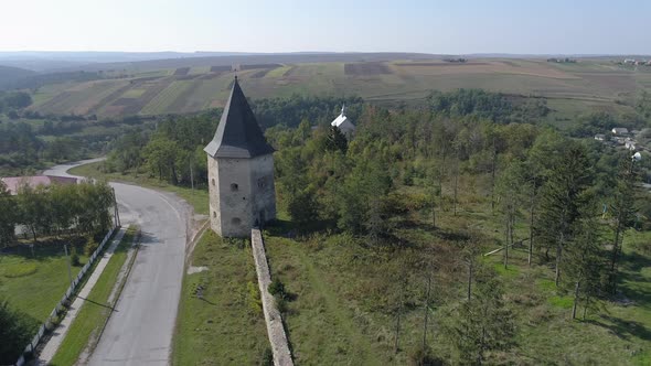 Aerial of a tower near a road