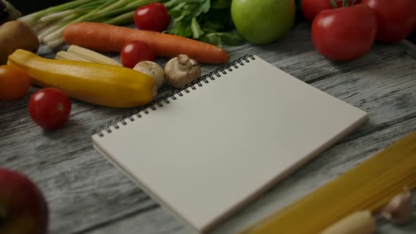 Blank Notebook Near Cooking Ingredients