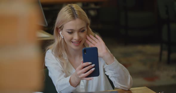 Happy Young Woman Holding Smart Phone Making Video Call Shooting Social Media Blog Talking with