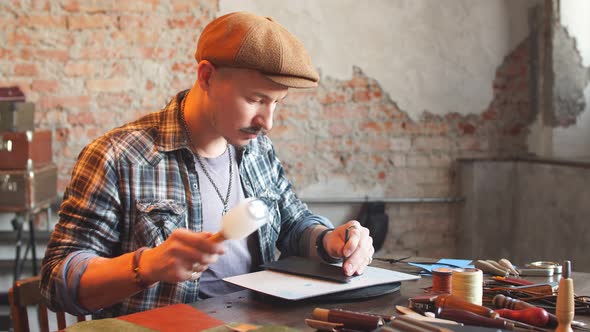 Hardworking Man Smoothing Flattening the Cloth