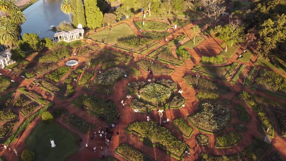 circular aerial view of a group of tourists walking around the Rosedal Park in Buenos Aires Argentin