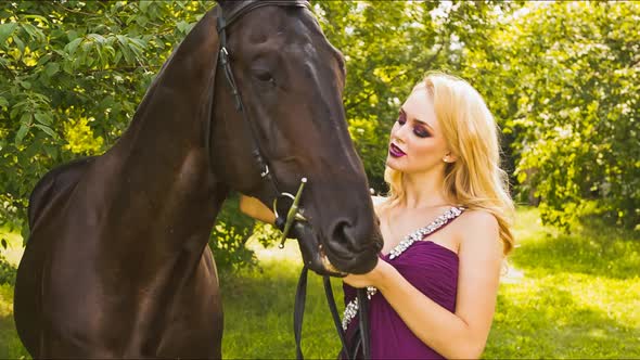 Beautiful Girl in the Park With a Horse 1237