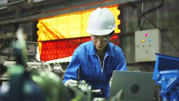 asian female Professional engineering wearing uniform and safety goggles