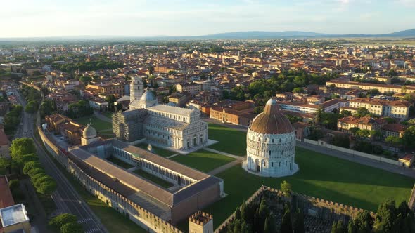 Aerial view of Piazzale dei Miracoli in Pisa at sunset, Italy.