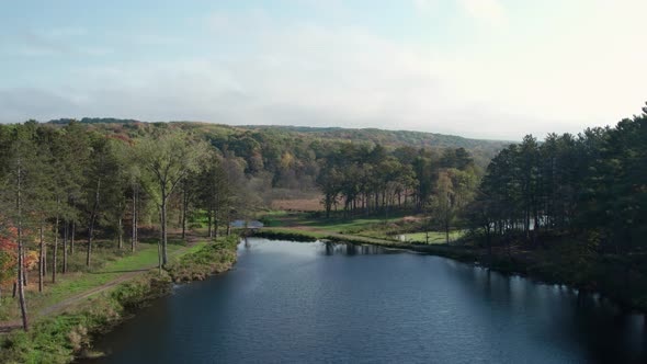 Aerial shot of a river on a sunny day in the Midwest United States