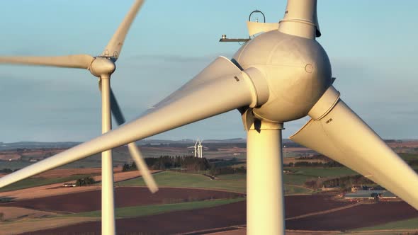 Wind Turbines at Sunset Generating Renewable Energy alt