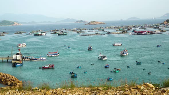 Fish farming operations in the South China Sea, lots of boat activity