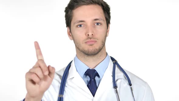 Portrait of Doctor Waving Finger to Refuse