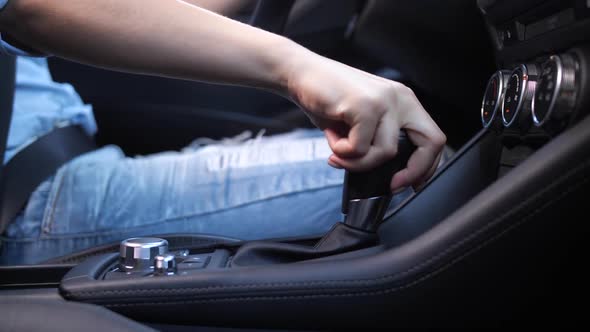 Woman's Hand Switching Automatic Transmission