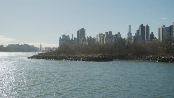 East River with the Mill Rock and the city of New York