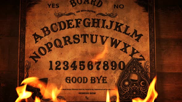 Ouija Board On Flames