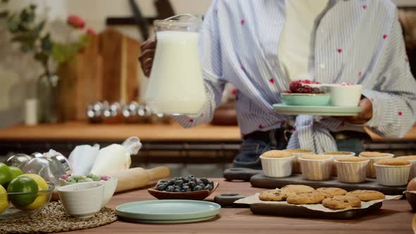 African American Woman Cooking Cupcakes