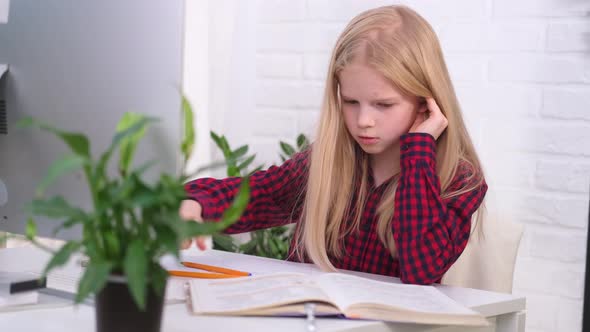 Blonde Schoolgirl Studying at Home Doing School Homework