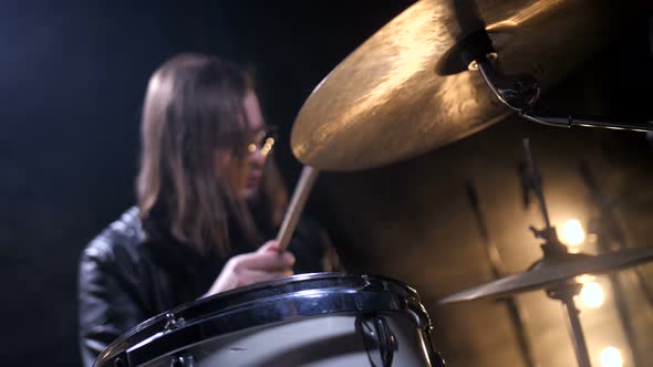 Rock Musician Playing on Drums in Recording Studio