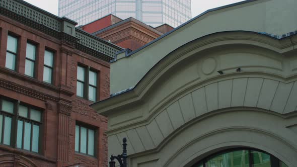 The KPMG Tower behind old buildings