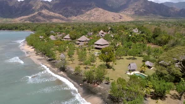 Aerial view above of luxury bungalows on a resort, Bali island, Indonesia.