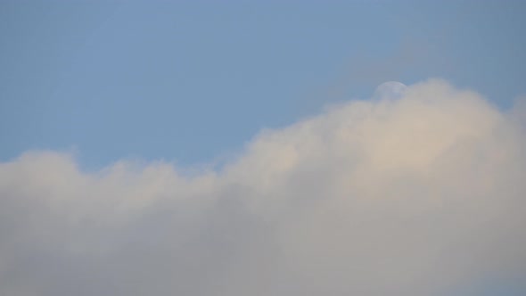 Clouds and moon on the sky