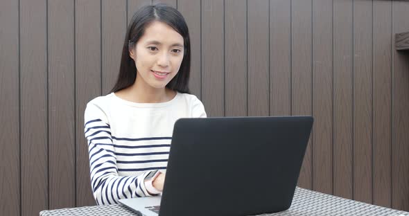 Woman using notebook computer