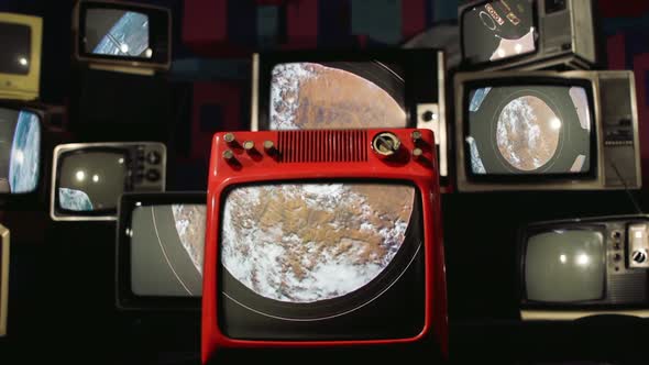 The Cupola (ISS module) and Earth as Seen on a Pile of Retro TVs.