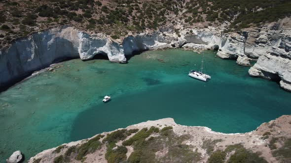 Boat and sailboat in turquoise water. Holiday in idyllic place. Aerial view