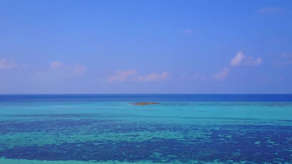 Aerial drone travel of exotic coastline beach break by blue sea and sand background