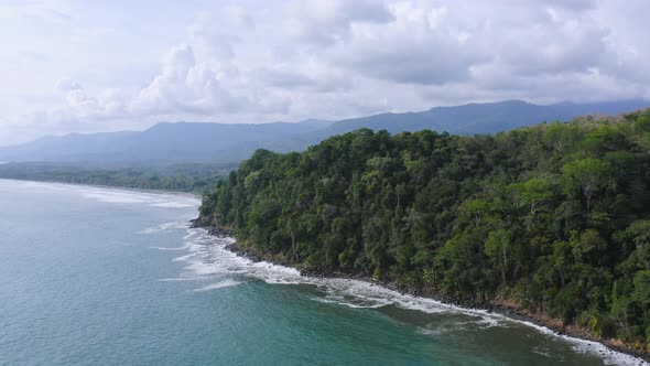 Aerial Drone View of Rainforest on the Pacific Ocean Coast in Costa Rica, Coastal Tropical Jungle La