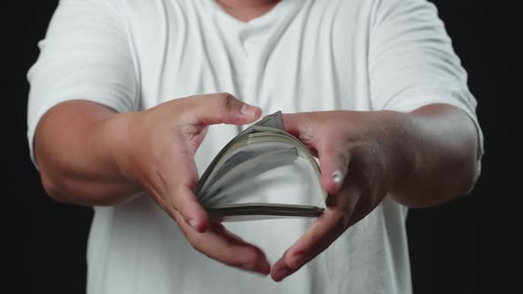 Man Shuffling Cards, Cardistry On Black Background