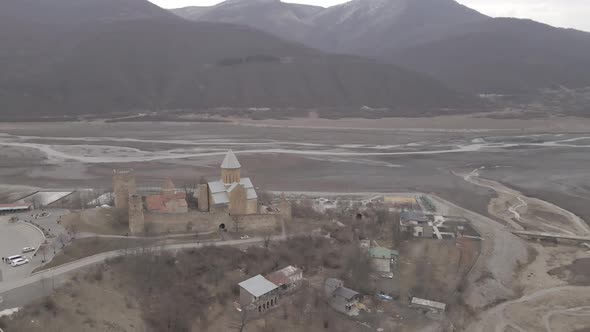 Aerial view of old Ananuri Fortress with two churches and picturesque view on river. Georgia 2021