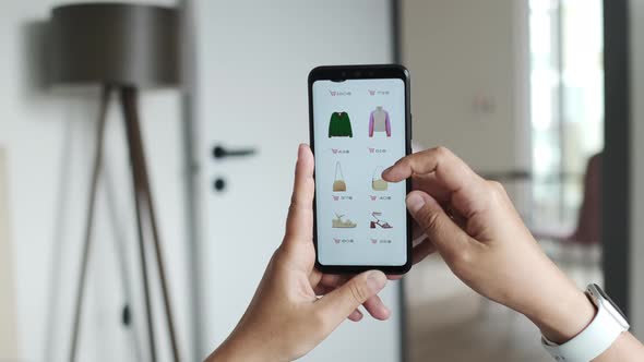 CloseUp of Woman Looks at Goods in Online Store Clothing or Mobile App