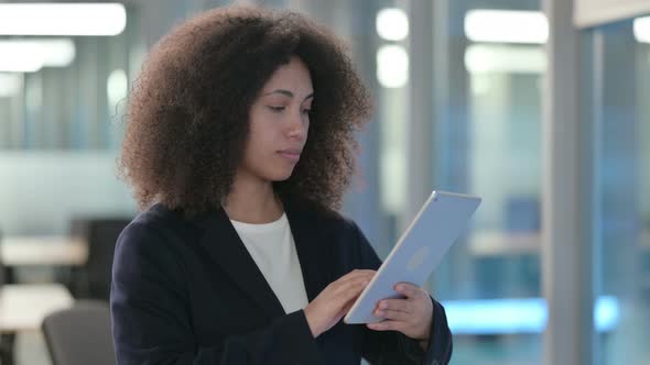 Portrait of African Businesswoman Attending Video Call on Tablet