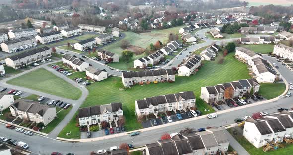 Aerial of sprawling suburban community townhome. Town house apartment buildings.