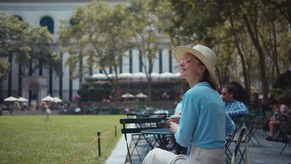 Young tourists with a paper cup