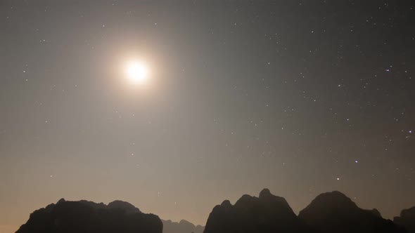 Stars and moon rise light movement time lapse in Scenic mountains