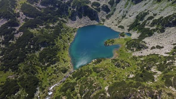 Aerial View of a Lake in the Pirin Mountains with Blue Clear Water