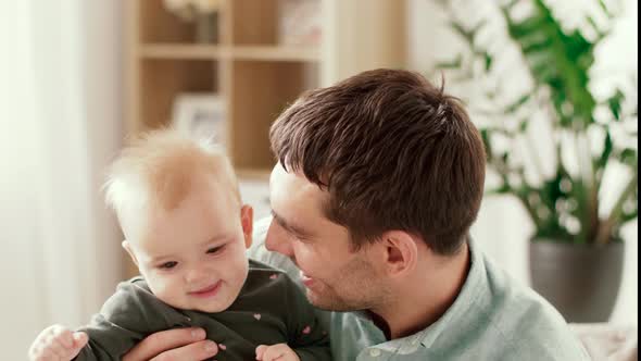 Happy Father with Little Baby Daughter at Home 6