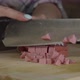 The Girl Cut Slices of Sausage Closeup - VideoHive Item for Sale