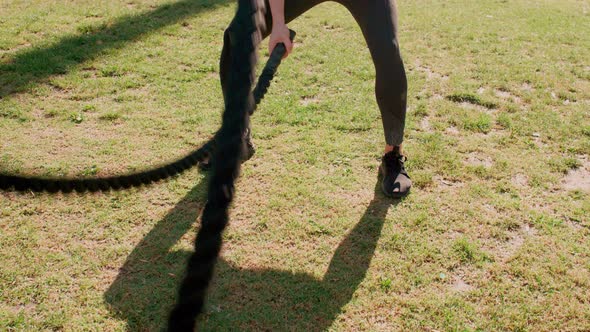 Very Athlete Woman Works Out In The Park