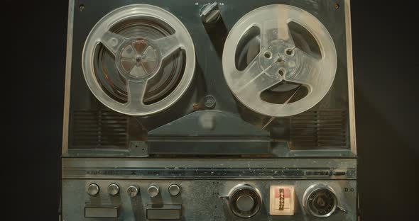 Vintage tape recorder with sound reels spinning