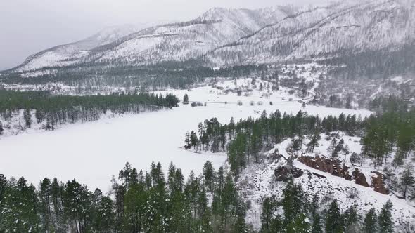 Drone Footage of a Popular Winter Resort Location for Skiing and Snowboarding